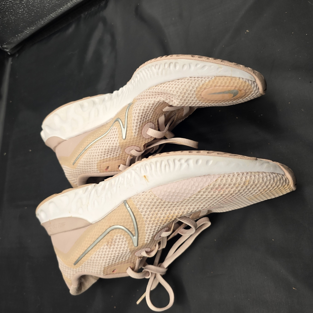 Nike Cream and White Athletic‎ Shoes with Streamlined Design
